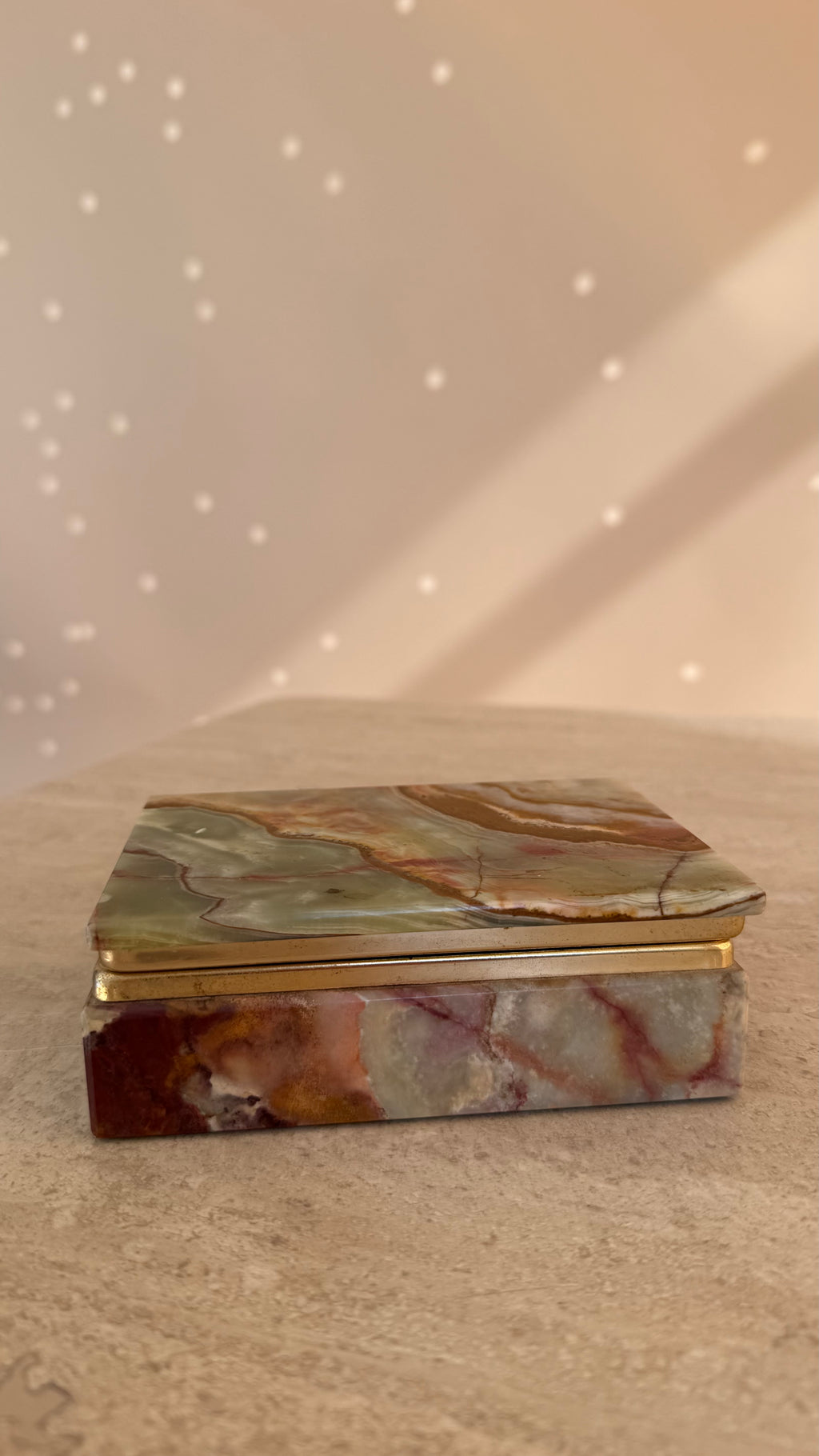 Vintage onyx sieradendoos met messing details